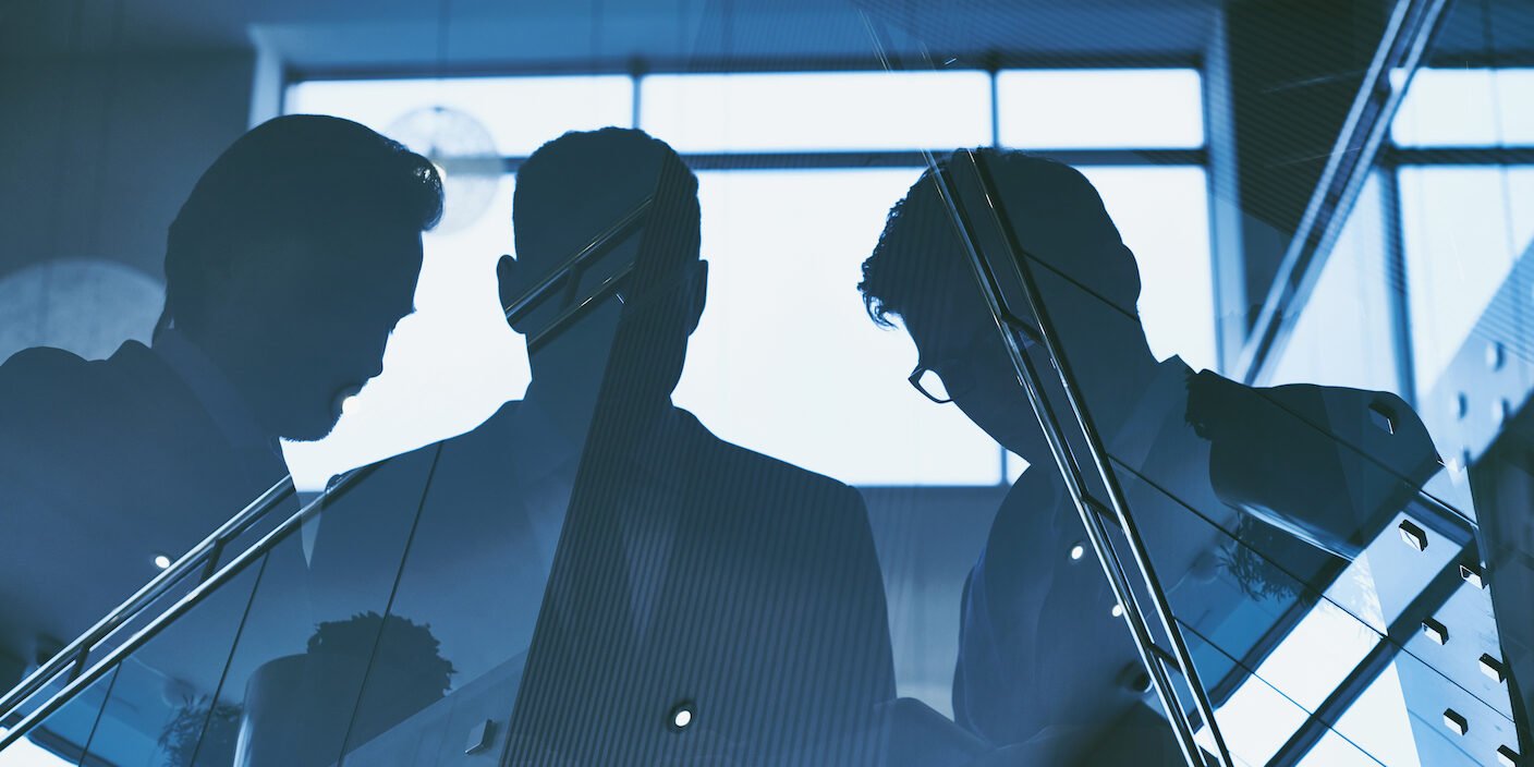 Outlines of group of businessmen working